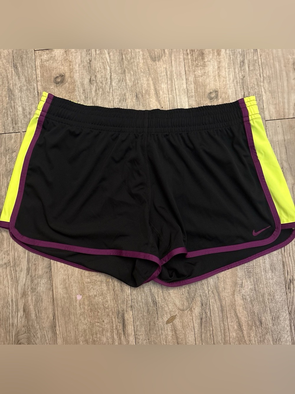 Nike Black Women's Athletic Shorts with Purple Trim and Neon Yellow Panels